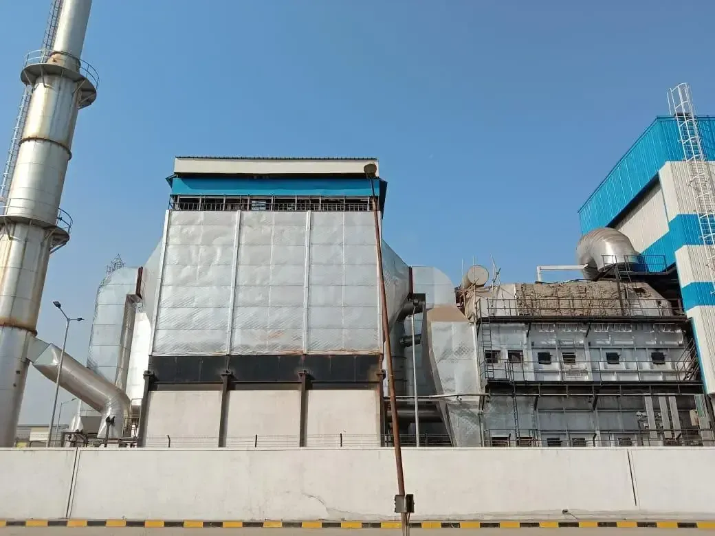 Clad hot air generator with flue gas ducting and stack at a chemical plant